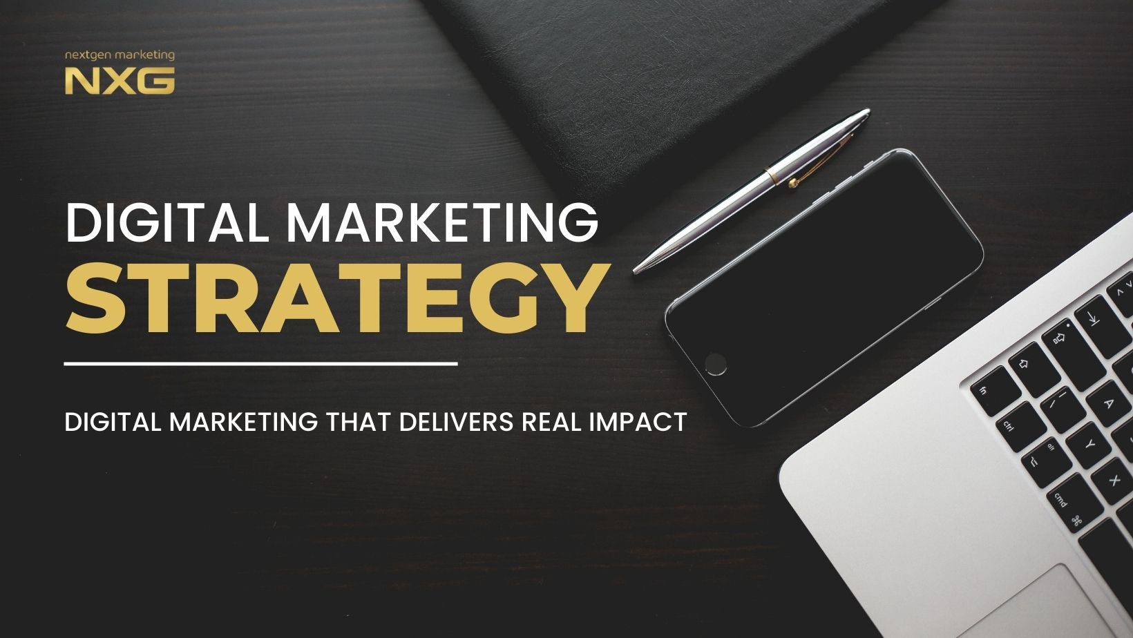 Overhead view of a laptop, notebook, and pen, symbolizing focused digital marketing strategy and planning for business growth.